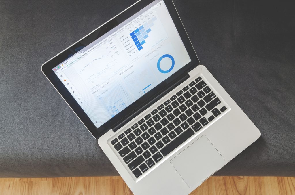 Laptop displaying website analytics dashboard during a technical SEO audit