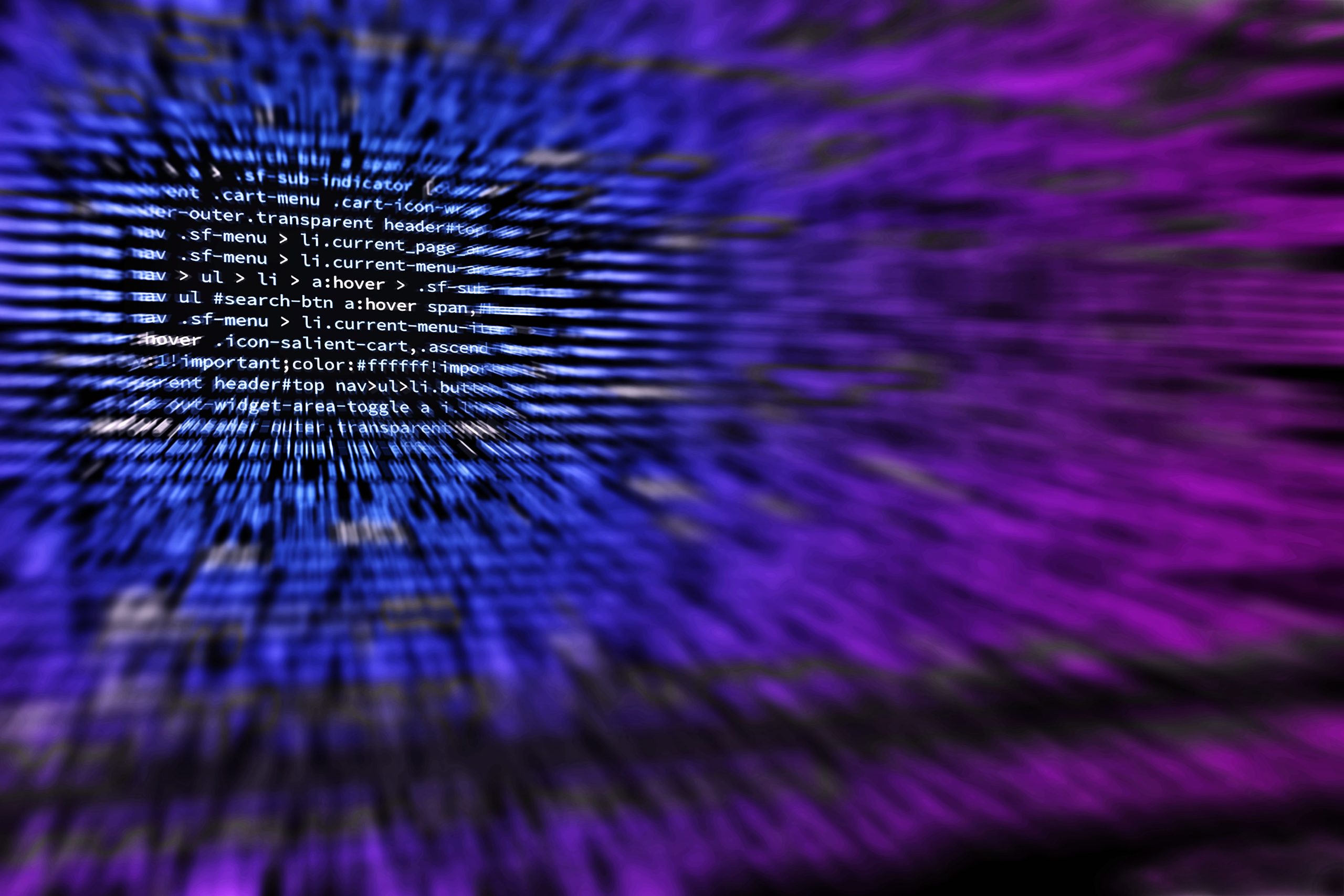 Developer working on website code during site migration process